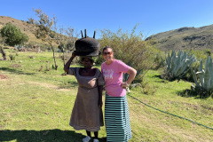 Ginger greeting one of the villagers.