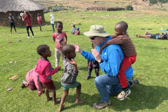 Pastor Marc having fun with some of the kids.