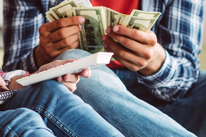 Couple working on balancing their budget